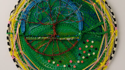 Nature’s Harmony 2 Nature’s Harmony 2, by Judy Phillips, Embroidery background, craft metal sculpture with beads, 20 inch diameter circle