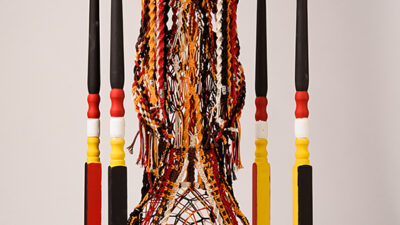 Threads of Humanity Threads of Humanity, by Judy Phillips, macrame cording on metal hoop, approximately 12 x 12 x 24 inches