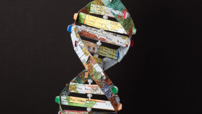 Eleanor Mitten, All the Atoms of the Earth Proclaim Thee to Be God, Mixed media: Maps, Paper, wire, paint, clay, part of an old globe, ~3 feet tall